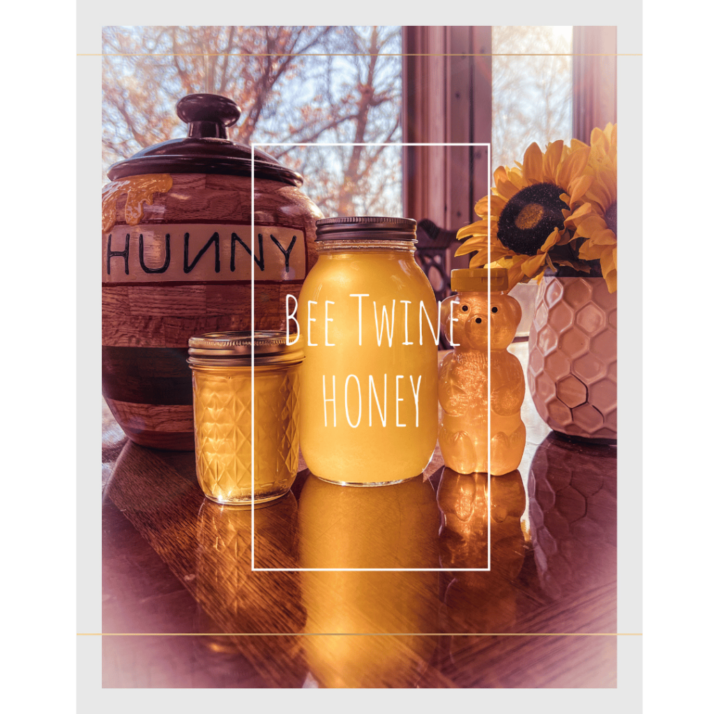 Honey on a table next to a honey jar