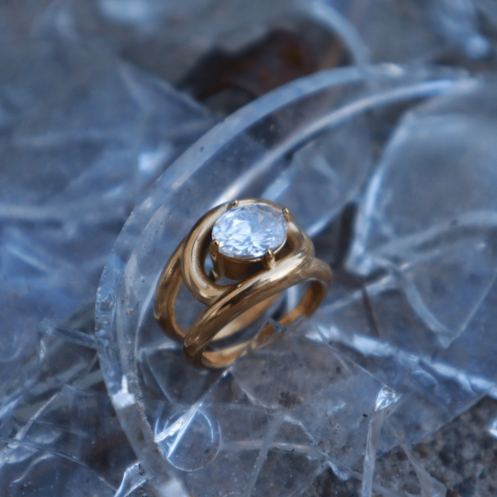 Gold Ring On Glass Jewelry Photo shoot